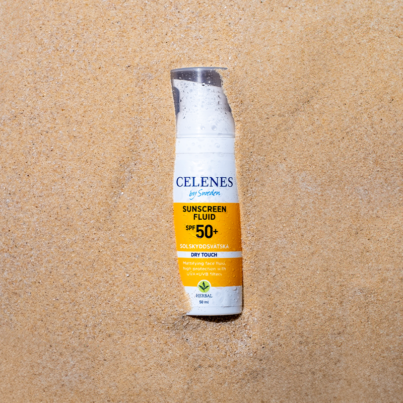 FLUIDE SOLAIRE AU DRY TOUCH AUX HERBES 50+ SPF